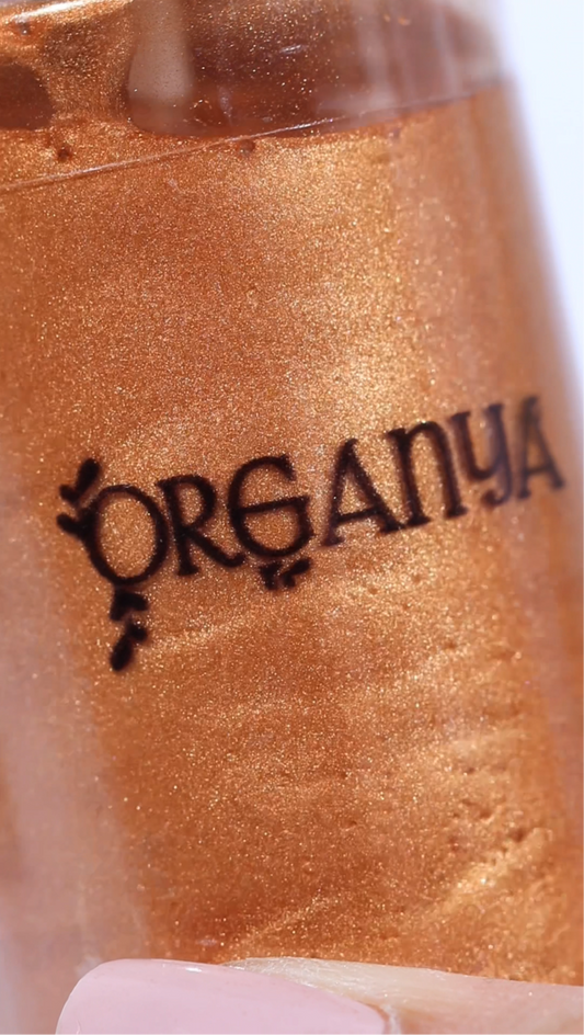 Body shimmer spray in bronze